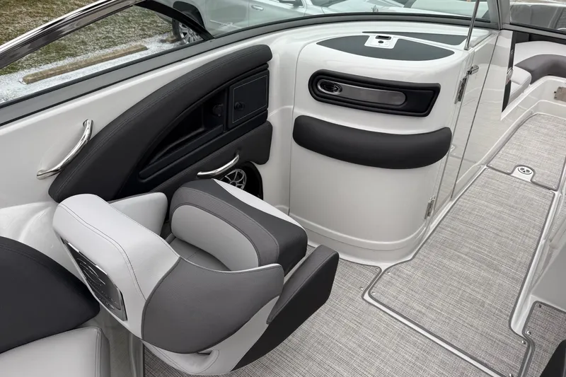 Slide: The Image of 2026 Crownline 288 SS boat interior with sleek seating and modern design. - 15