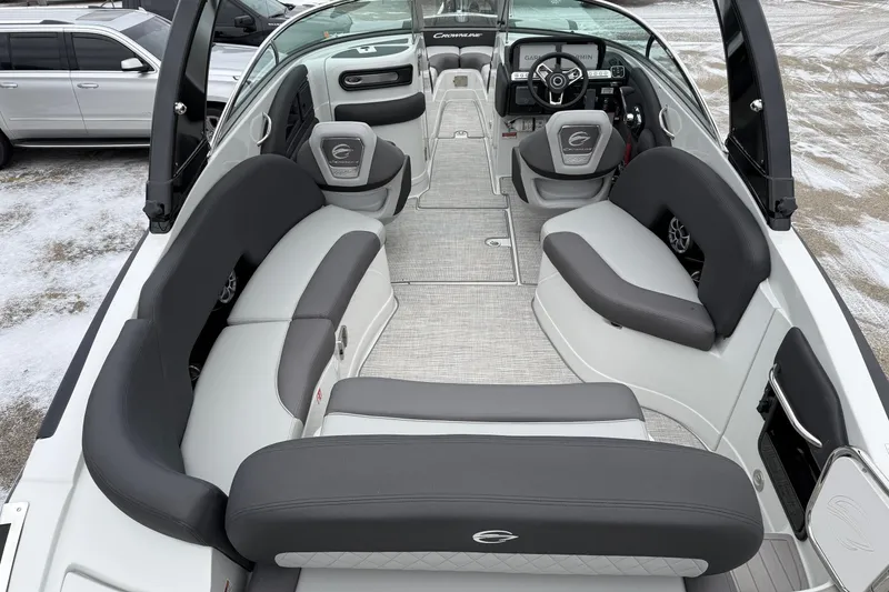 Slide: The Image of 2026 Crownline 288 SS boat interior with luxurious seating and modern dashboard. - 6