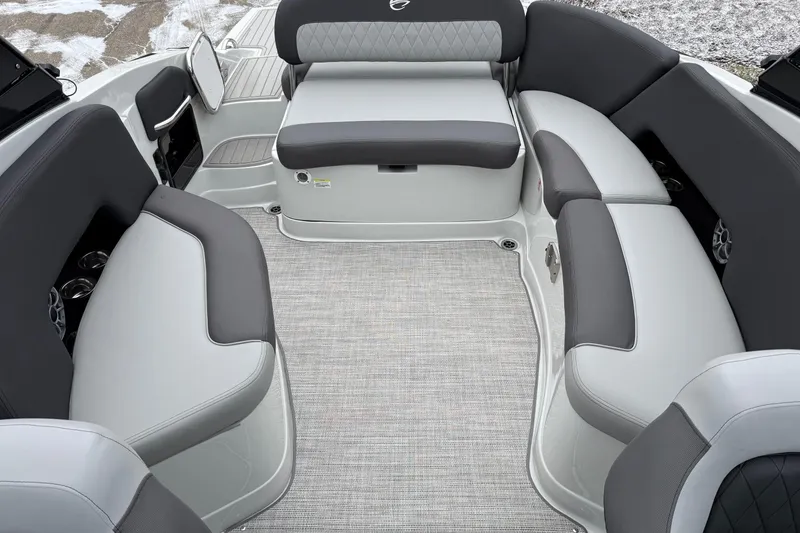 Slide: The Image of Luxurious seating area of 2026 Crownline 288 SS boat with gray upholstery. - 7