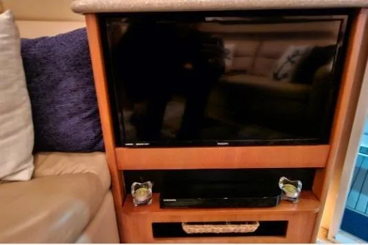 Slide: The Image of Entertainment center in 2003 Meridian 381 Sedan with TV and sound system. - 10