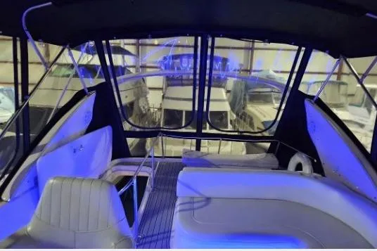 Slide: The Image of 2003 Meridian 381 Sedan interior with blue lighting and spacious seating. - 27