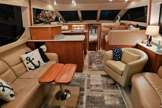 Slide: The Image of Luxurious interior of 2003 Meridian 381 Sedan yacht with elegant seating and decor. - 4