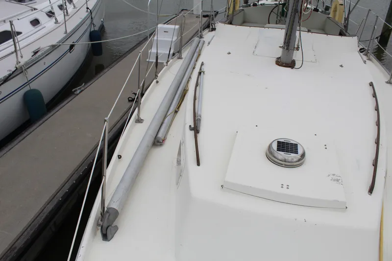 Slide: The Image of 1973 Gulfstar 41 Ketch CC docked at a marina. - 24
