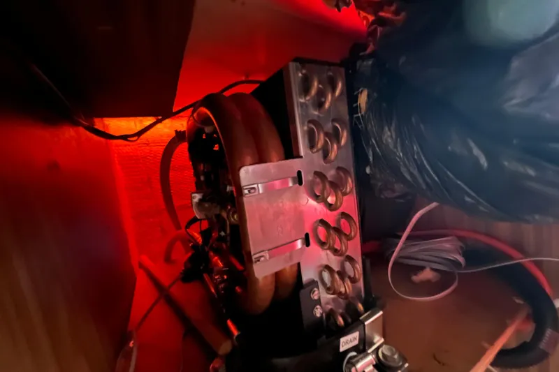 Slide: The Image of Engine compartment of a 1973 Gulfstar 41 Ketch CC, illuminated with red lighting. - 30