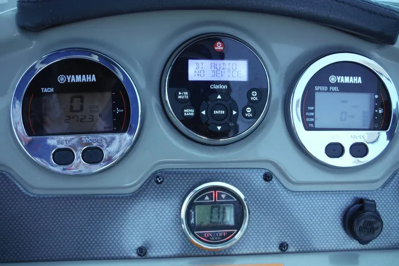 Slide: The Image of Dashboard of a 2018 Chaparral 21 H2O Sport OB with Yamaha gauges and Clarion audio system. - 23