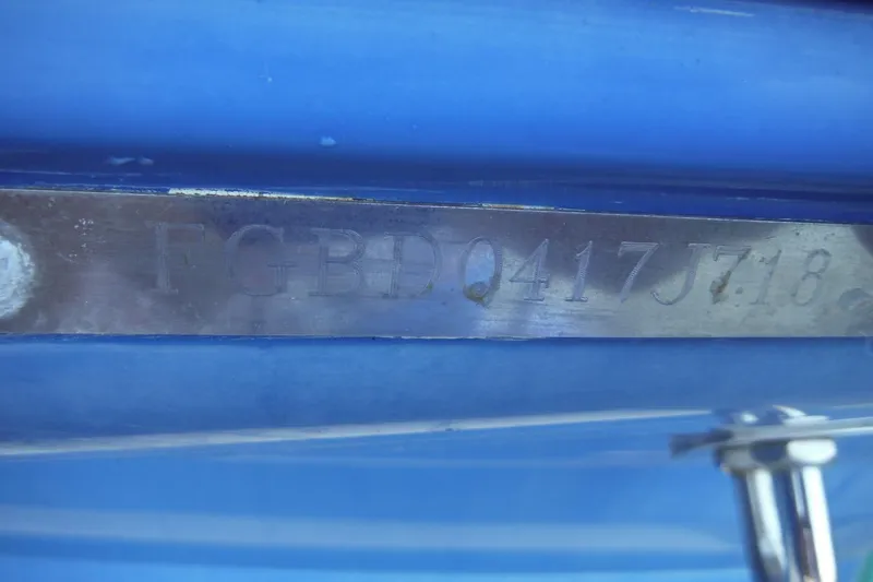 Slide: The Image of Close-up of a 2018 Chaparral 21 H2O Sport OB hull identification number. - 38