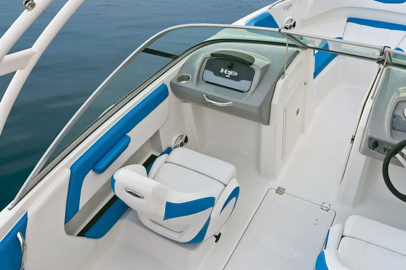Slide: The Image of Manufacturer Provided Image: 2018 Chaparral 21 H2O Sport OB boat interior with blue and white seating. - 5