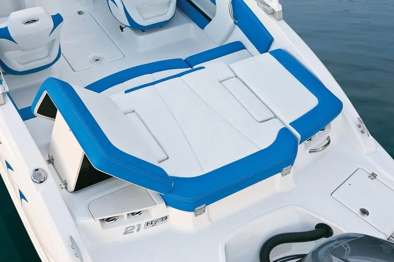 Slide: The Image of Manufacturer Provided Image: 2018 Chaparral 21 H2O Sport OB boat interior with blue and white seating. - 7