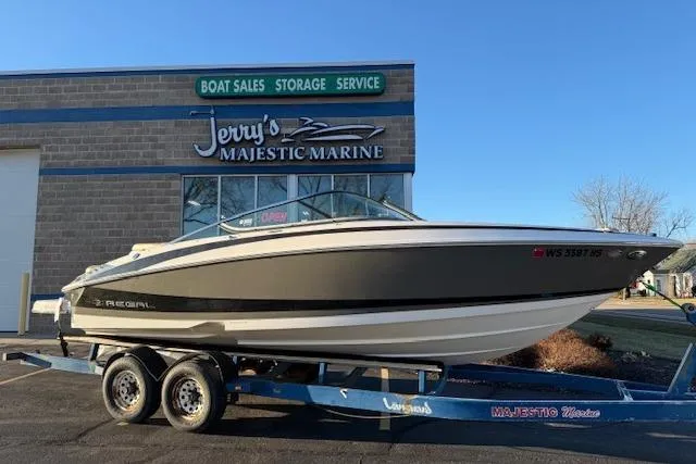 Slide: The Image of 2010 Regal 2300 Bowrider boat on trailer at Jerry's Majestic Marine dealership. - 1