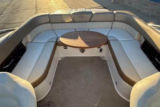 Slide: The Image of 2010 Regal 2300 Bowrider boat storage compartment with cooler and gear. - 27