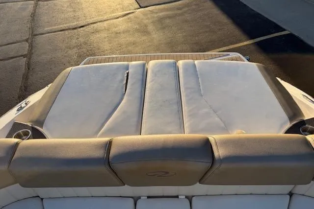 Slide: The Image of 2010 Regal 2300 Bowrider boat propeller and outdrive on a trailer. - 30