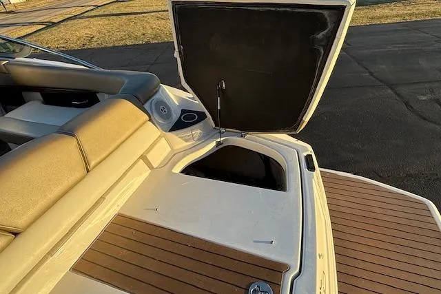 Slide: The Image of 2010 Regal 2300 Bowrider boat on trailer at Jerry's Majestic Marine dealership. - 33