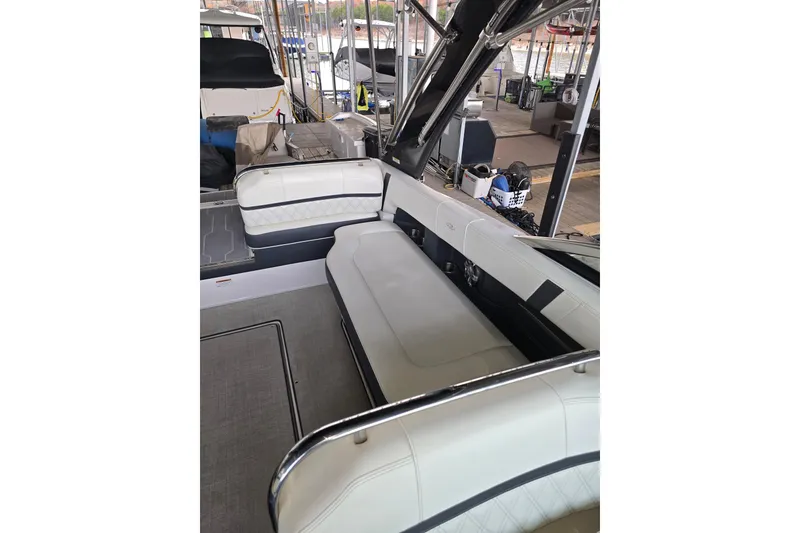 Slide: The Image of 2021 Regal 2800 Bowrider interior with white seating and modern design. - 20