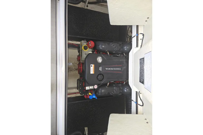Slide: The Image of Engine compartment of 2021 Regal 2800 Bowrider featuring Volvo Penta engine. - 32