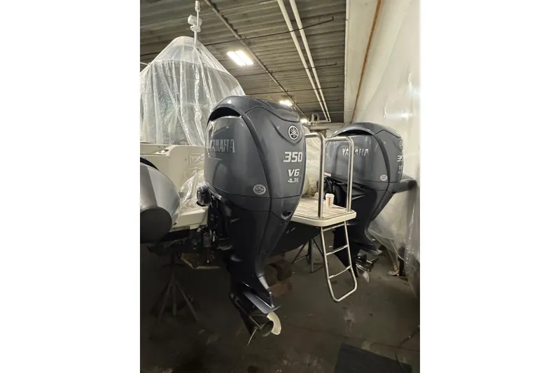 Slide: The Image of Twin Yamaha 350 V6 outboard engines on a 2016 Protector Tauranga 41 boat. - 10