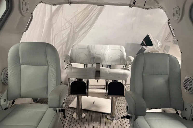 Slide: The Image of Interior of 2016 Protector Tauranga 41 boat with white leather seating. - 8