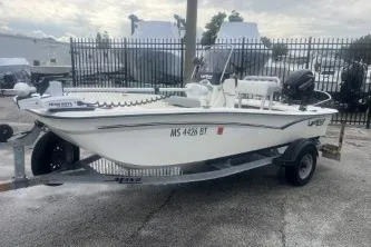 Slide: The Image of 2022 Mako Pro Skiff 15 CC boat on trailer, parked outdoors. - 4