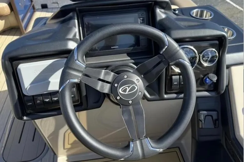 Slide: The Image of Steering wheel and dashboard of 2025 Veranda Relax VR 22 RC boat. - 4