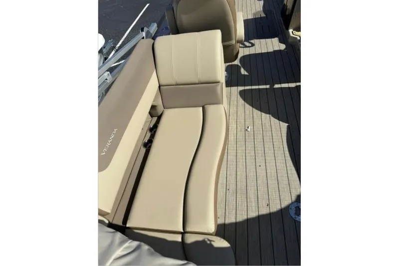 Slide: The Image of 2025 Veranda Relax VR 22 RC boat with beige seating and wood-style flooring. - 8