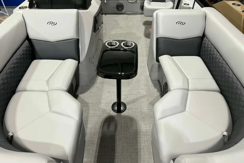 Slide: The Image of 2026 Manitou Encore SL 230 SHP interior with luxurious seating and sleek design. - 4