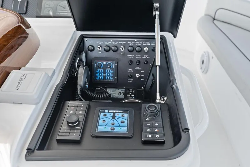 Slide: The Image of Control panel of 2022 Viking 48 Convertible yacht with advanced navigation systems. - 28