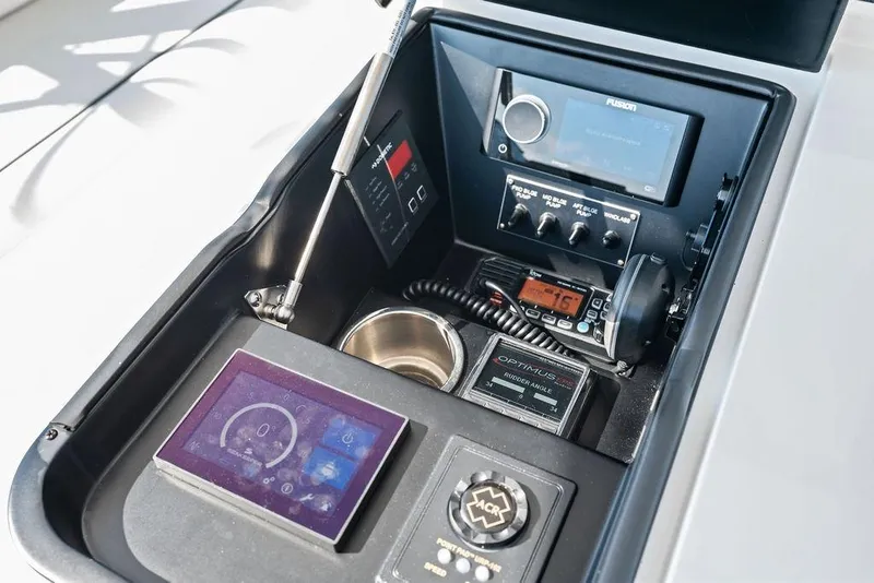 Slide: The Image of Control panel of 2022 Viking 48 Convertible yacht with navigation and communication equipment. - 29