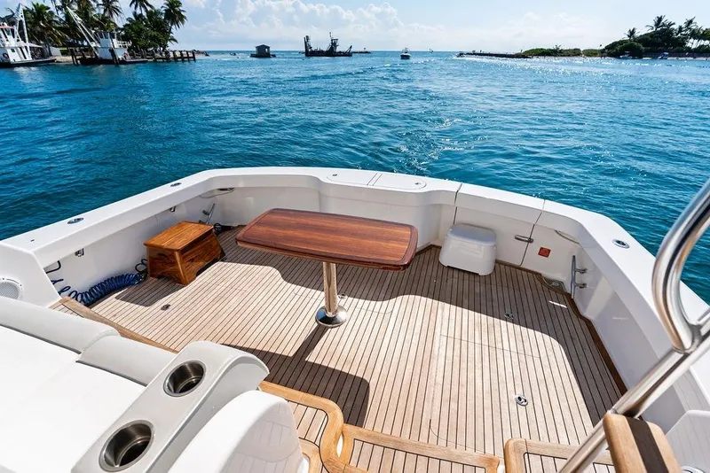 Slide: The Image of Luxurious deck of 2022 Viking 48 Convertible yacht with ocean view. - 36