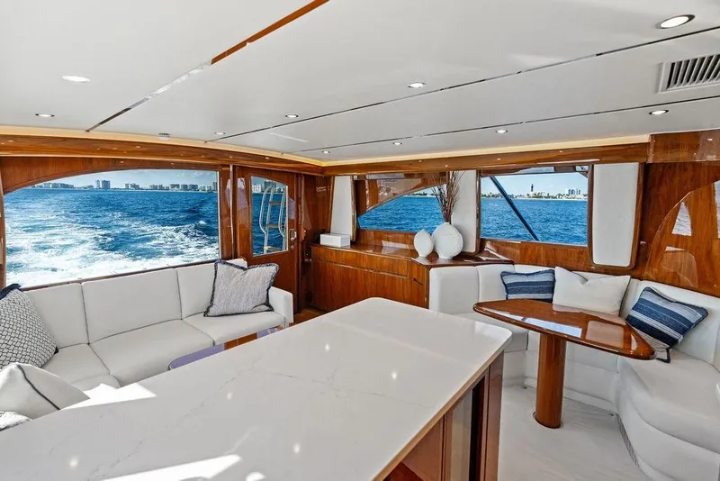 Slide: The Image of Luxurious interior of 2022 Viking 48 Convertible yacht with ocean view. - 41