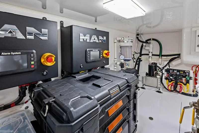 Slide: The Image of Engine room of 2022 Viking 48 Convertible yacht with MAN systems and tools. - 72