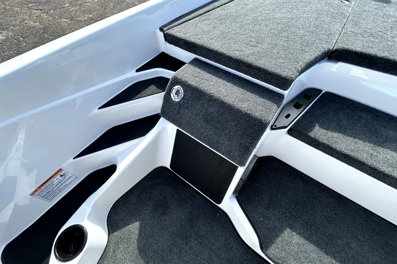 Slide: The Image of Interior view of 2026 Skeeter ZXE20 boat, featuring sleek design and carpeted surfaces. - 20