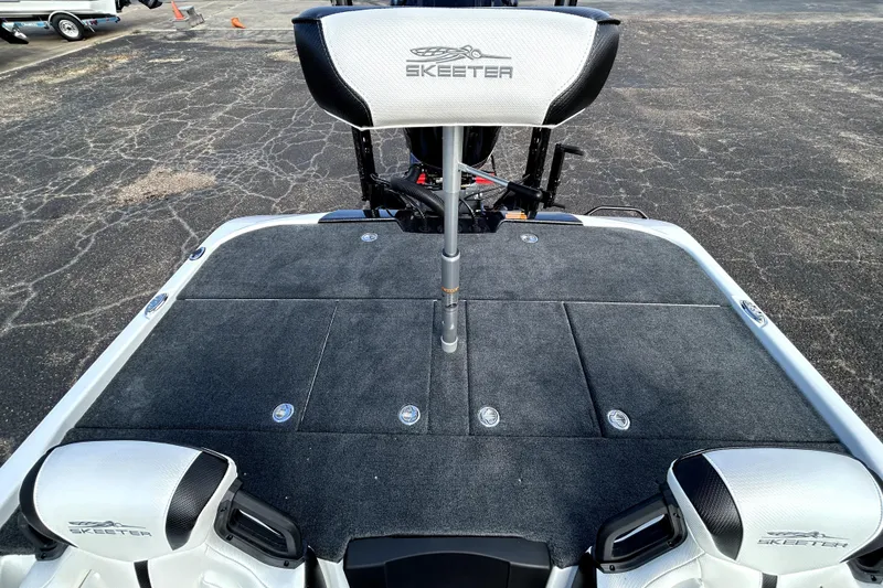 Slide: The Image of 2026 Skeeter ZXE20 boat deck with seating and storage compartments. - 27