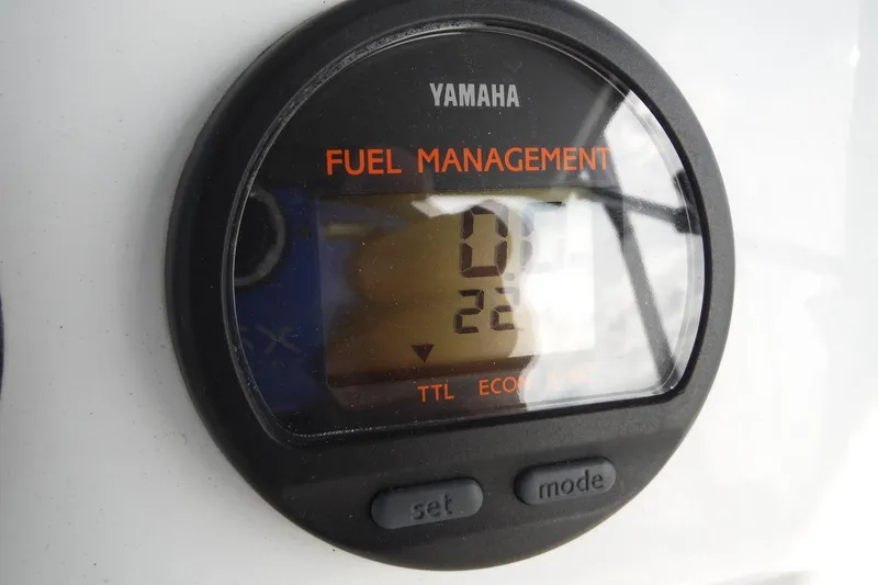 Slide: The Image of Yamaha fuel management gauge on 1999 Intrepid 289 Center Console boat. - 36