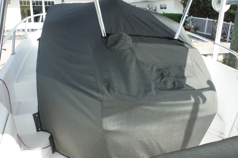 Slide: The Image of 1999 Intrepid 289 Center Console boat with covered helm station. - 5