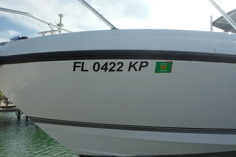 Slide: The Image of 1999 Intrepid 289 Center Console boat with Florida registration FL 0422 KP. - 58