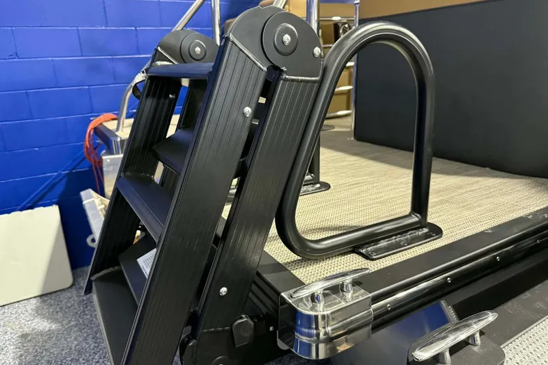 Slide: The Image of 2026 Manitou Encore VP 230 boat ladder and deck detail. - 18