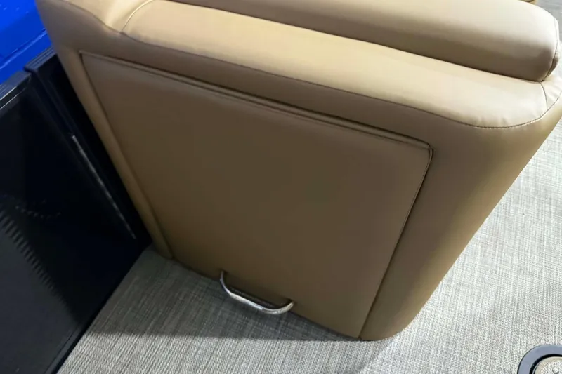Slide: The Image of 2026 Manitou Encore VP 230, tan leather seat detail, modern design. - 5