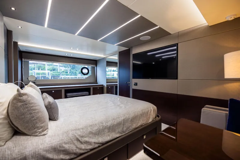 Slide: The Image of Luxurious Sunseeker 76 yacht bedroom interior, 2019 model, featuring modern design and large window. - 106