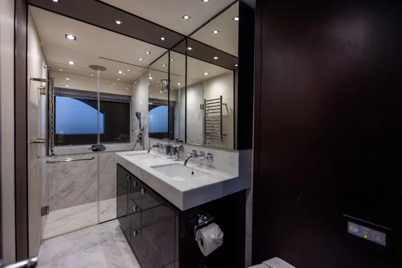 Slide: The Image of Luxurious bathroom in 2019 Sunseeker 76 yacht with marble finishes and modern fixtures. - 108