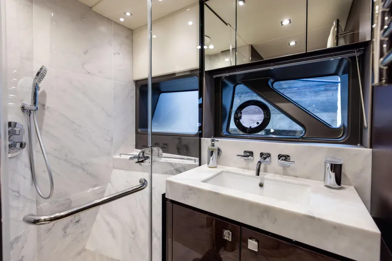 Slide: The Image of Luxurious bathroom in 2019 Sunseeker 76 yacht with marble finishes and modern fixtures. - 117