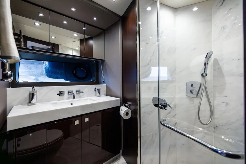 Slide: The Image of Luxurious bathroom in 2019 Sunseeker 76 yacht with marble and modern fixtures. - 126
