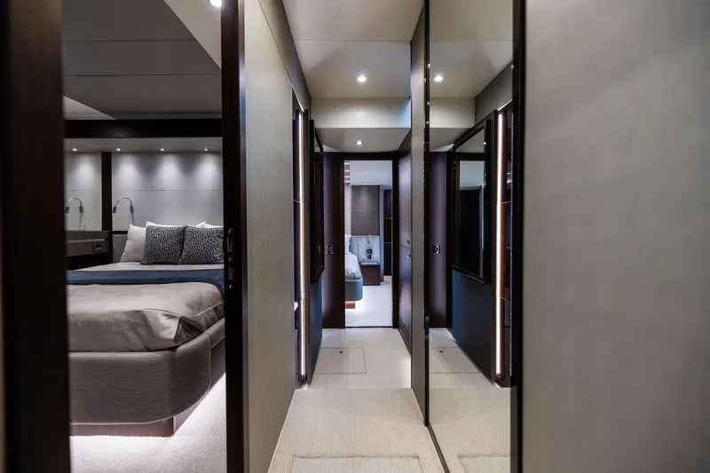 Slide: The Image of Luxurious interior of 2019 Sunseeker 76 yacht, featuring elegant bedrooms and modern design. - 128