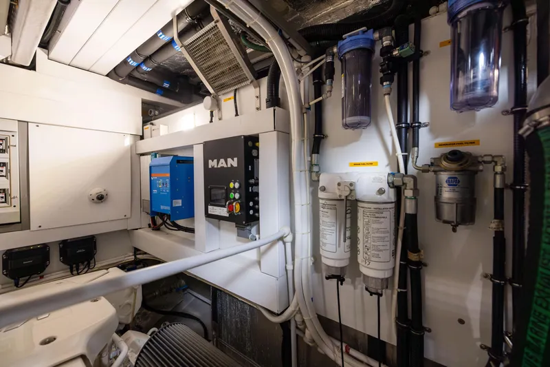 Slide: The Image of Engine room of 2019 Sunseeker 76 yacht with MAN control panel and filters. - 145