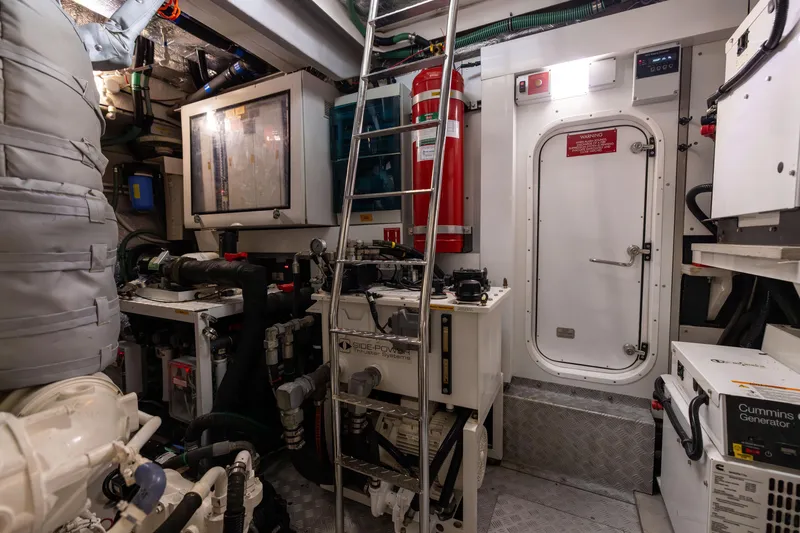 Slide: The Image of Engine room of 2019 Sunseeker 76 yacht with equipment and access ladder. - 153
