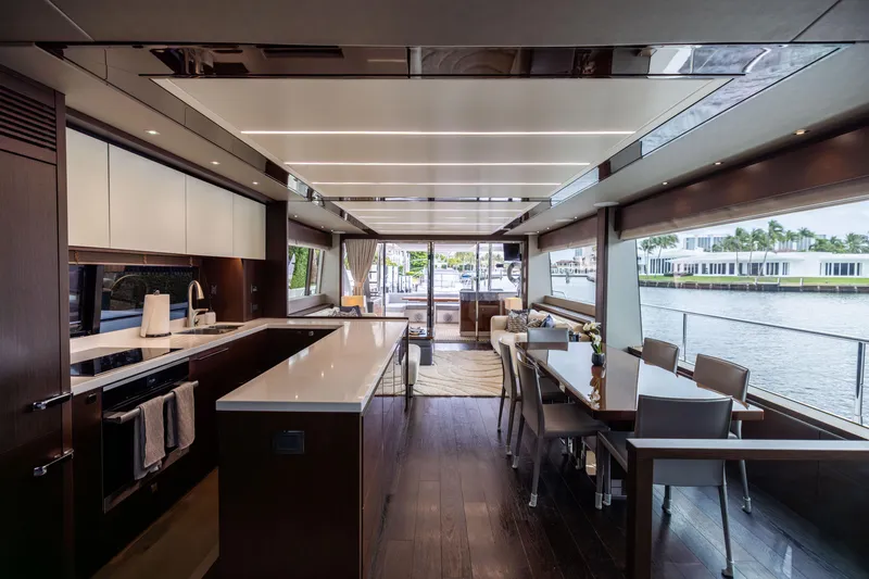 Slide: The Image of Luxurious interior of 2019 Sunseeker 76 yacht with modern kitchen and dining area. - 68