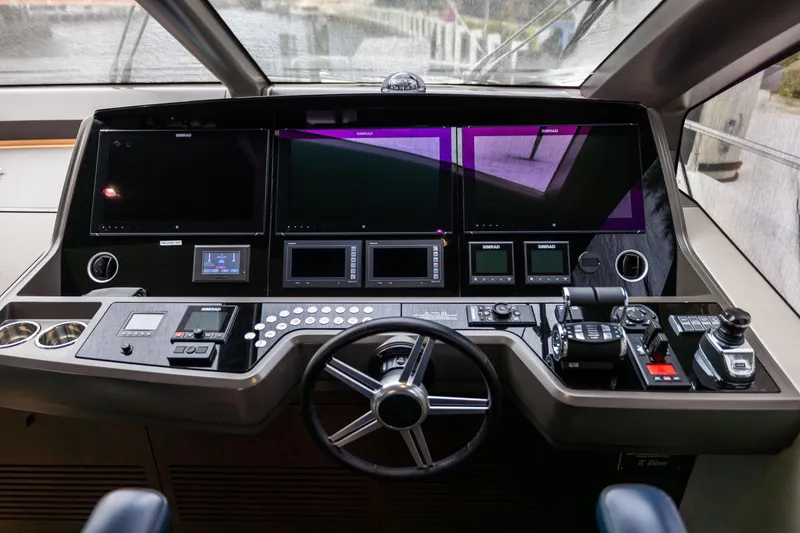 Slide: The Image of Control panel of a 2019 Sunseeker 76 yacht with advanced navigation systems. - 87