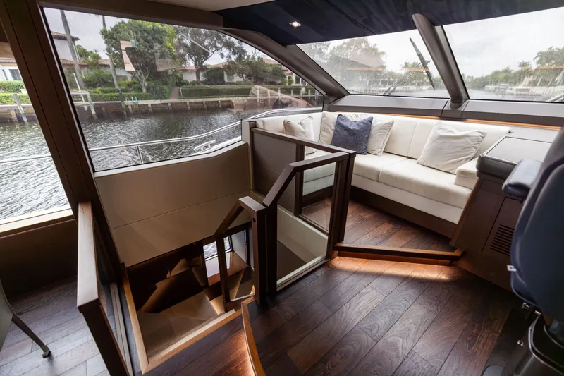 Slide: The Image of Luxurious interior of 2019 Sunseeker 76 yacht with elegant seating and wooden flooring. - 90