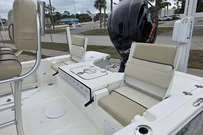 Slide: The Image of 2016 Sea Fox 22XTR Viper boat interior with seating and Yamaha 250 engine. - 10