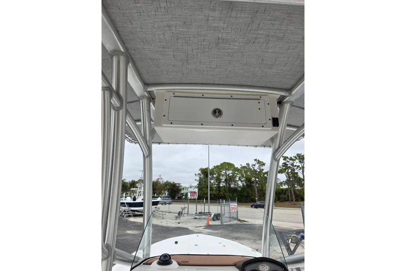 Slide: The Image of 2016 Sea Fox 22XTR Viper boat console with overhead storage and canopy. - 13
