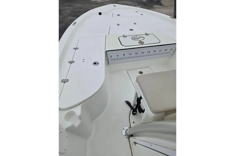 Slide: The Image of 2016 Sea Fox 22XTR Viper boat deck with storage compartments and seating. - 15