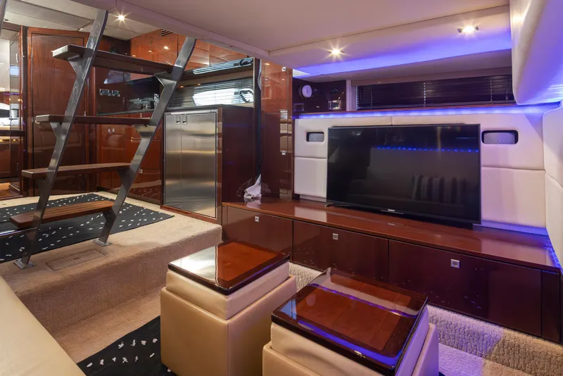Slide: The Image of Luxurious interior of 2010 Sea Ray Sundancer yacht with modern entertainment system and elegant design. - 36